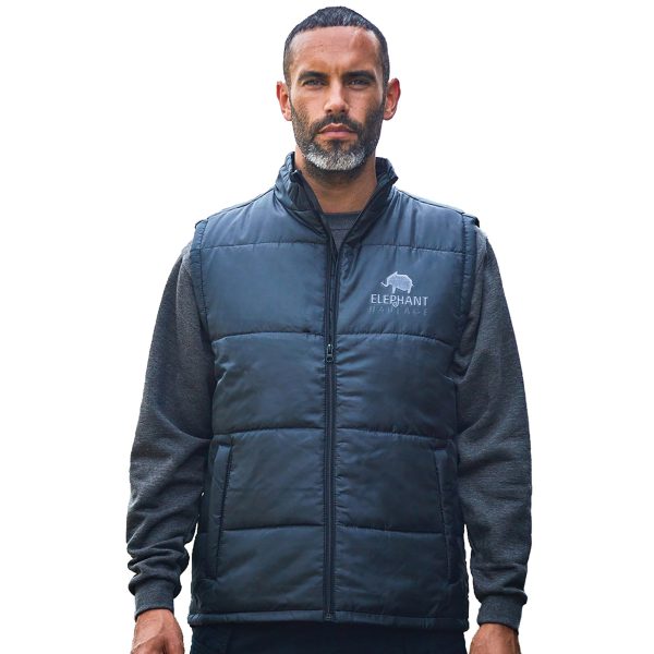 This cosy and stylish bodywarmer offers both warmth and functionality. Quilted for extra padding with a water-repellent outer it is ideal for everyday layering. Complete with two side front zipped pockets and a dropped back hem for extra comfort, this versatile piece is perfect for all your adventures!