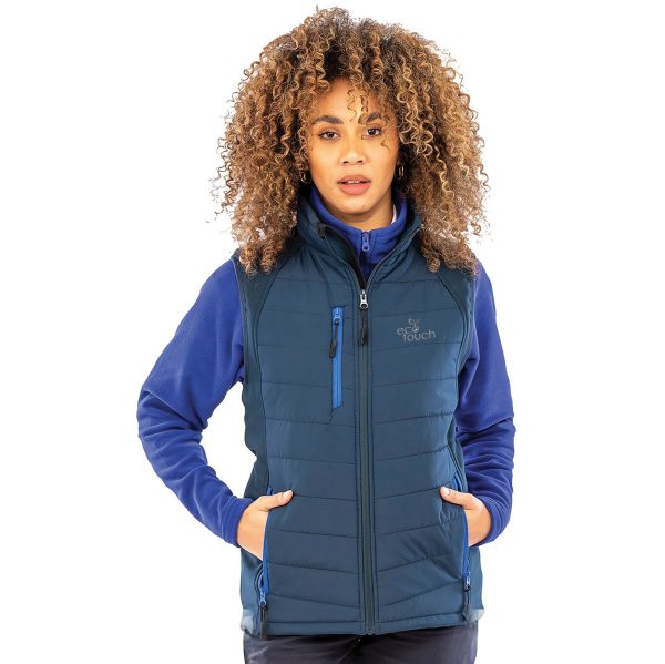 This Compass Padded Gilet is made from 100% recycled polyester, this heavy padded fleece-lined jacket is warm, showerproof, windproof and breathable. The outer body of the Gilet and the inner filling are crafted from materials derived from recycled plastic bottles and post-industrial waste, providing a sustainable alternative to conventional yarns. Supersoft and lightweight to carry your embroidered logo.