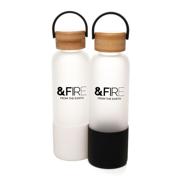 This elegant glass bottle combines style and functionality with a bamboo lid and convenient carry handle for easy portability. The bottom half is wrapped in a protective silicone sleeve, offering a secure grip and added durability. Perfect for staying hydrated on the go!