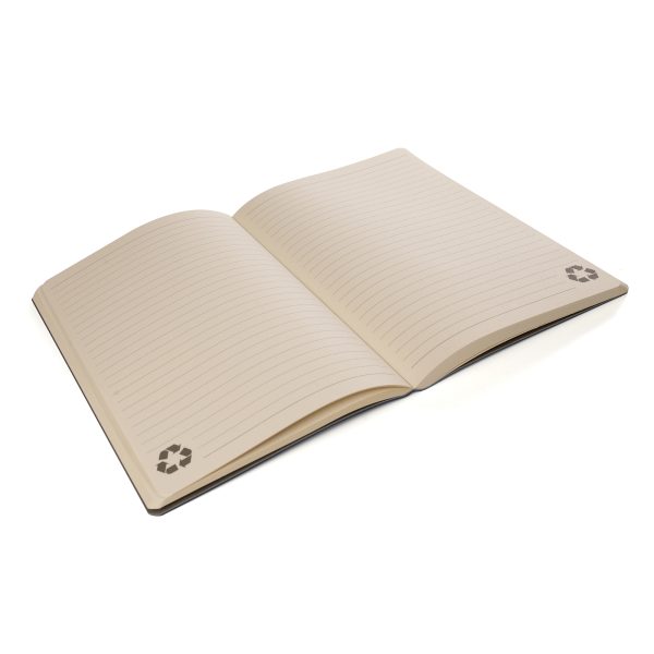 A5 Flexi premium notebook exudes sophistication, crafted with PU soft touch cover and 80 lined sheets of ivory recycled paper, reducing the need for virgin materials and helping to save trees. The notebook features a water-based adhesive binding with a round spine, allowing for clean effortless page removal without compromising its durable structure, perfectly combining style and practicality.