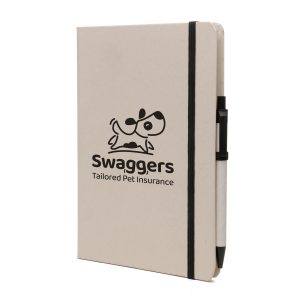 2-in-1 recycled milk carton A5 notebook set includes a matching ball pen made from recycled milk carton and ABS cap. Featuring 80 plain milk carton sheets with pen loop, ribbon and an elastic closure to keep your notes secure.