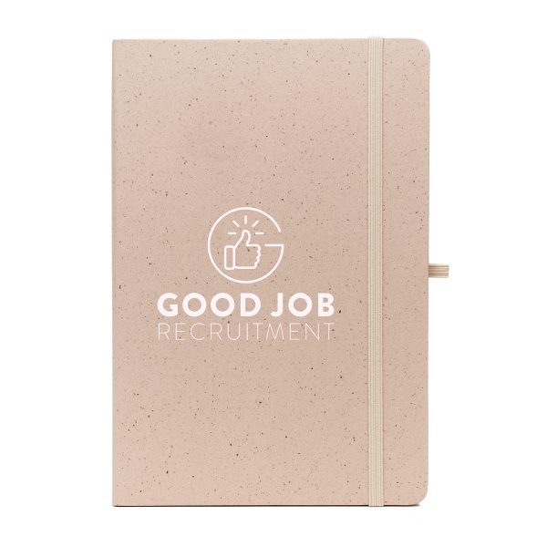 A5 notebook features a stylish fruit paper cover, recycled inner pages, recycled elastic closure, recycled ribbon and pen loop. It's compact and functional, with a variety of colours available to complement your branding.