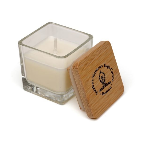 This elegant glass candle holder features a soy wax candle with a cotton wick for a clean, long-lasting burn. It comes with a bamboo lid and a silicone seal ring for freshness. Perfect for branding, it offers space for logos on both the glass and lid.