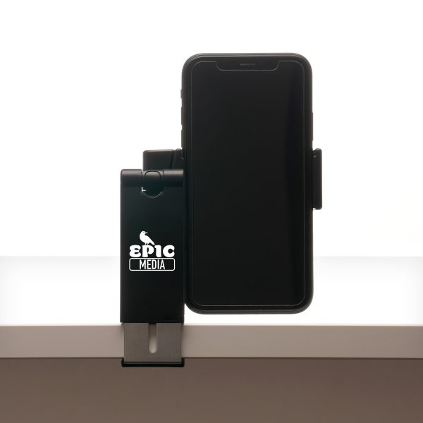 Recycled ABS plastic phone stand with adjustable clip, slider and desk clamp. This is a must have desk accessory, making it convenient for hands free, secure phone usage while on the go.